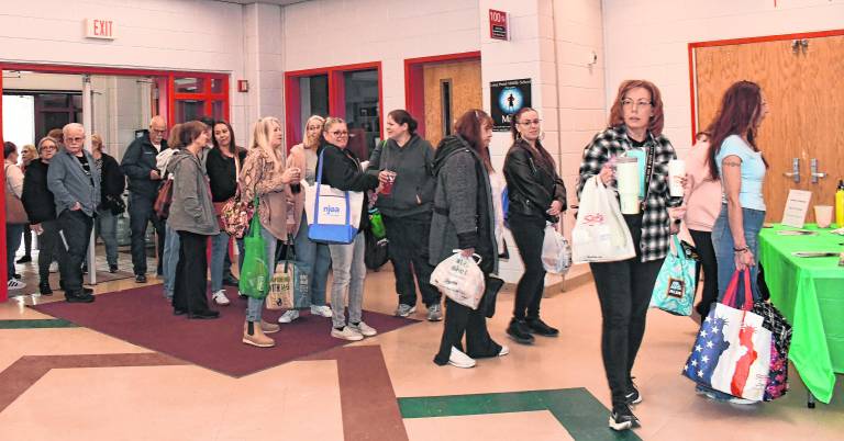 Guests line up to enter the tricky tray.