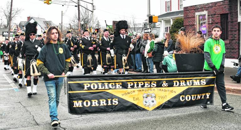 Morris County Police, Pipes &amp; Drums marches in the parade.