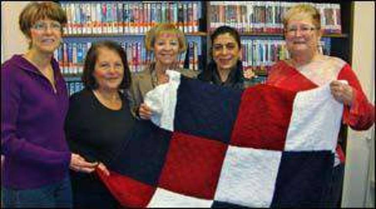 Knitters stitch together comfort for soldiers