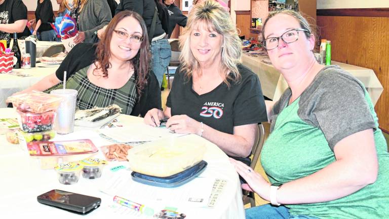 Veronica Decker of Matamoras, Pa., Tammy Zajac of Matamoras, Pa., and Jessica Eichner of Newton pose for a photo.