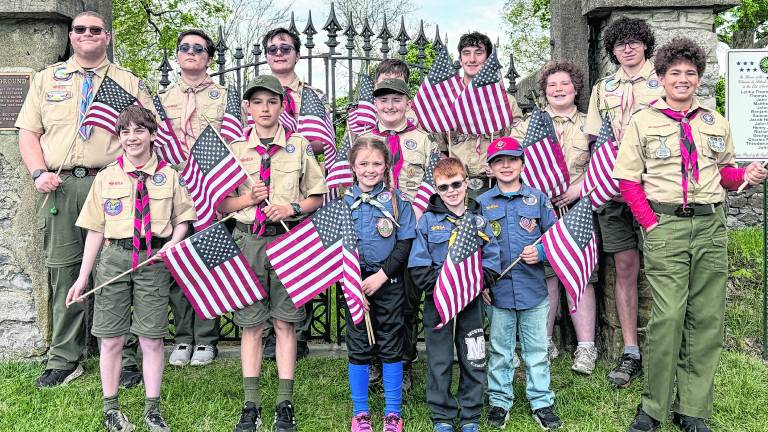 Scouts from Troop 85, Pack 85, and Pack 181 replaced over 700 flags of veterans graves at the Newton, St. Joseph’s, and Andover cemeteries on Saturday May 2.