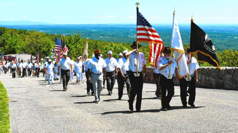 <b>Veterans march up to the New Jersey Veterans Memorial in High Point State Park on Sunday, June 29. (Photos by Maria Kovic)</b>