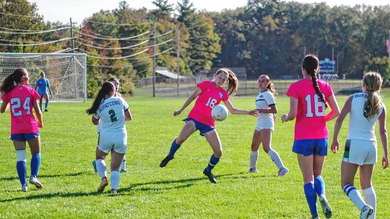 Kittatinny's Kendra Deckert (18) reacts to the ball in a home game against Hopatcong on Oct. 3. The Cougars won, 7-1, to advance in the Hunterdon/Warren/Sussex Tournament. (Photos by George Leroy Hunter)