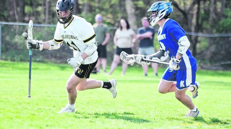 West Milford's Brendan Coscia carries the ball while being pursued by Kittatinny's Niko Martinez. Coscia scored 1 goal.