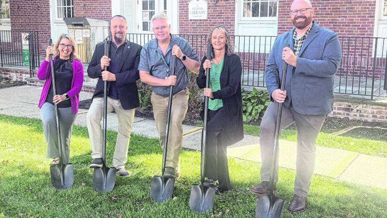 David Silverthorne, Sussex County Commissioner; Keith Nelson, Director of Sussex County Facilities Management; Elke Yetter, Sussex County Treasurer; and Will Porter, Director of Sussex County Library System break ground at the Dennis Branch.