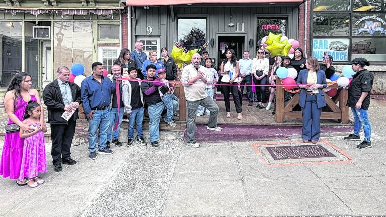 <b>The ribbon is cut on the Town of Newton’s newest eatery, La Casa De Campo, located at 11 Main Street in Newton. Family owned and operated, they offer Spanish-American food which includes steak, chicken, seafood and burgers. </b>