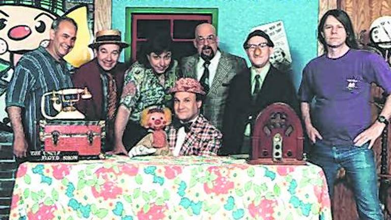 Uncle Floyd Vivino is shown with the rest of hte cast of the Uncle Floyd Show.