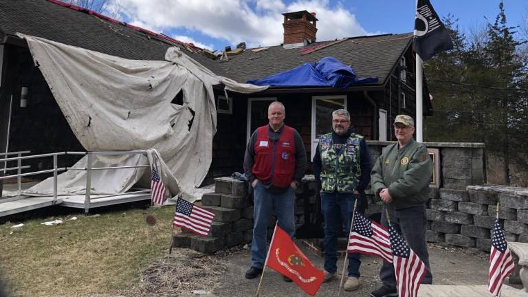 From left, Brian Taggart, John Feeney and Robert Glesias stand in front of American Legion Post 86 in Andover Township on March 15. The Lowe’s home improvement store in Newton paid for a new roof for the post as part of its Hometown Heroes program. (Photos by Kathy Shwiff)