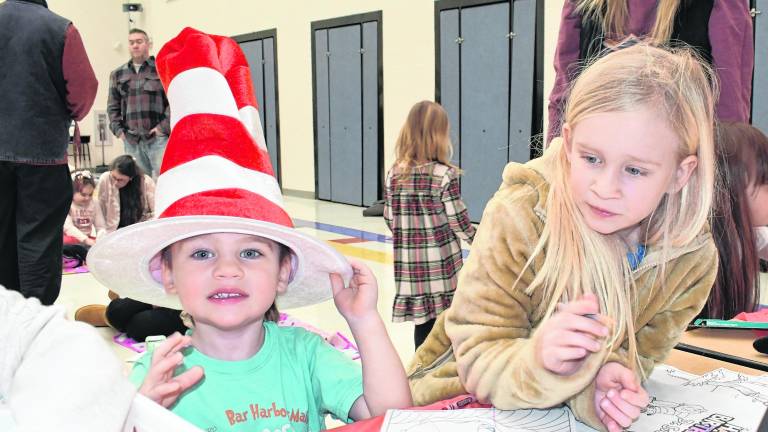 Benny and Allie Loverdi work on a craft.