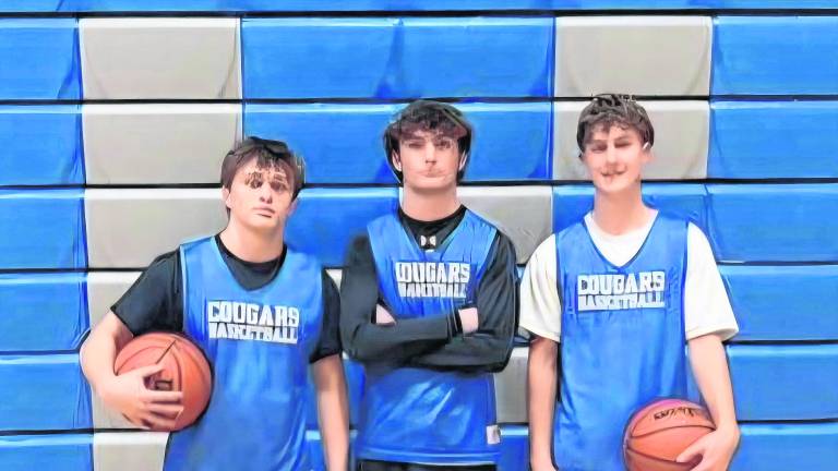 From left, Justin Blair, Michael Strong, Mason Reed