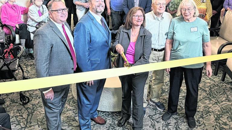The ribbon is cut on renovations at Bristol Glen.