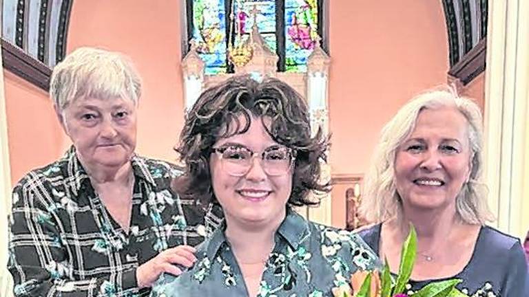 Addison Hardin, center, received a music scholarship from the Sussex County Oratorio Society.