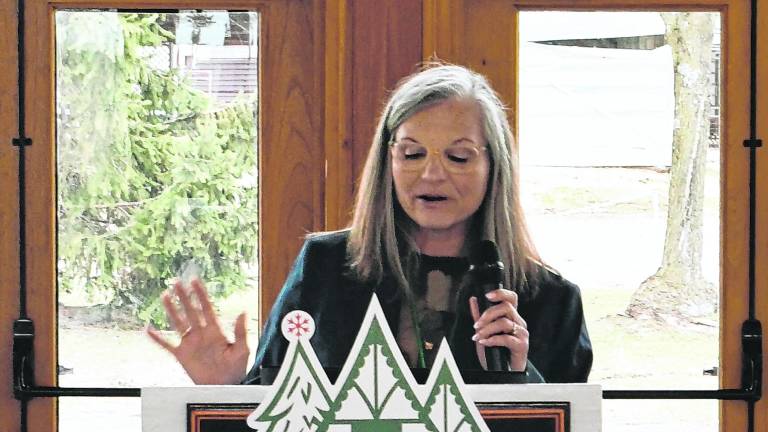 <b>Sabine Watson, president of German Christmas Market of N.J. gives a speech.</b>