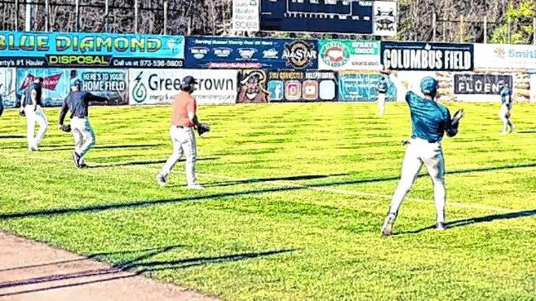 <b>Athletes warm up by playing catch before taking part in open tryouts for the Sussex County Miners in April 2024 at Skylands Stadium in Augusta. (File photo by Jay Vogel)</b>