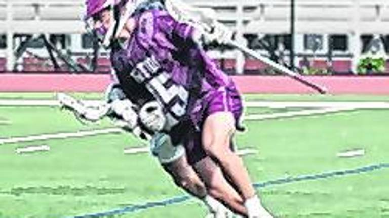 Newton's Evan Cotter (25) is on the move with the ball. Cotter scooped up 5 ground balls (GB) and scored 1 goal.