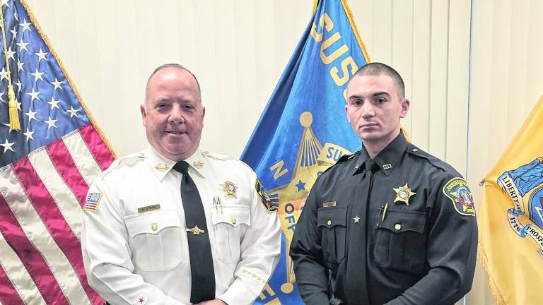 <b>Sussex County Sheriff Michael Strada is shown with recently graduated Sheriff’s Investigator Leo Haines.</b>