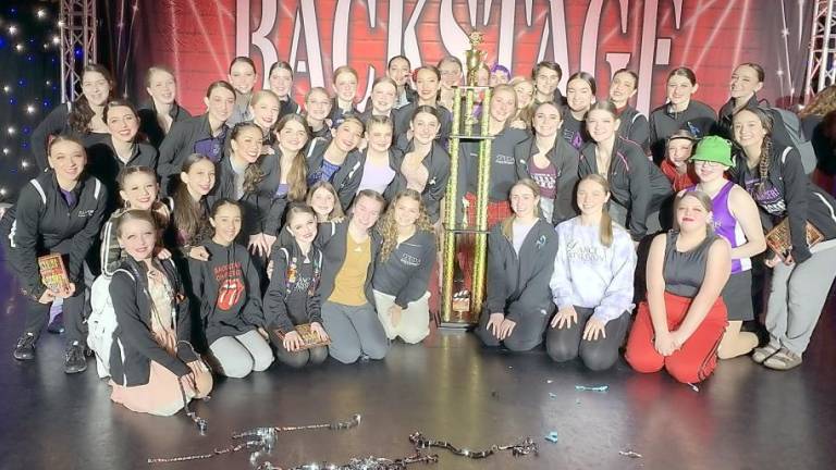 Dance Expression dancers with their trophy (Photo provided)
